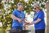 Cub Scouts at the lake - Scout leaders grilling hot dogs; preparing food; lunch; dinner; grill