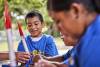 Cub Scouts building model rockets